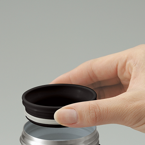 Plastic cover around the mouth of the mug for drinking comfort