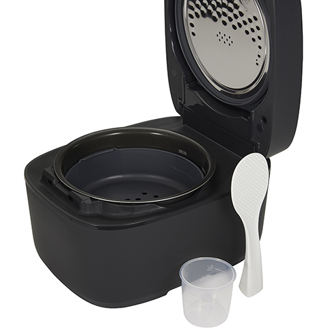 Steaming tray, self-standing rice spatula and measuring cup accessories