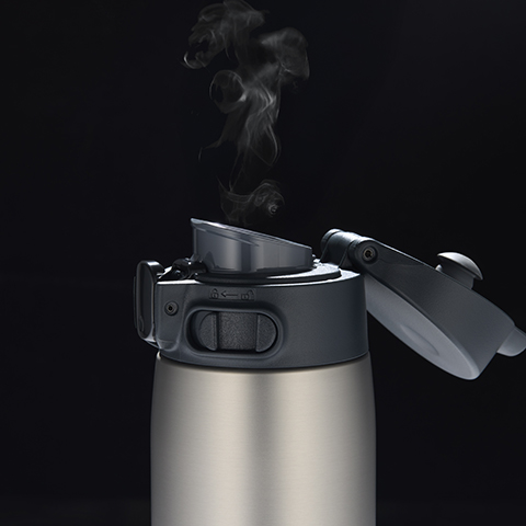 Flip-lid keeps sip spout clean when closed