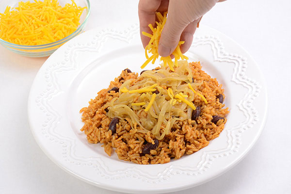 
              Chili Cheese Rice and Hot Dogs Step 7
      	