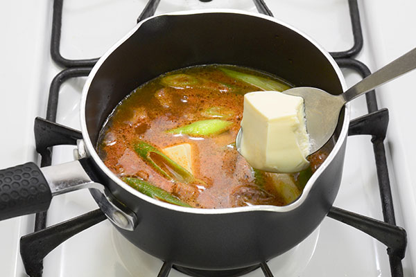 
              <i>Sundubu Jjigae</i> (Korean Tofu Soup) Step 5
      	