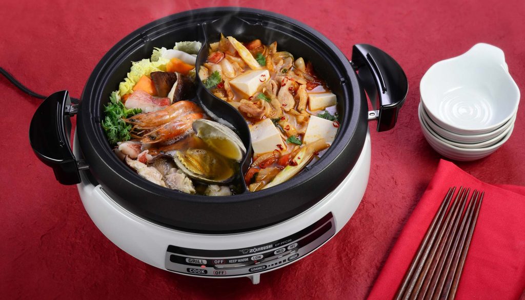 https://www.zojirushi.com/blog/wp-content/uploads/2023/01/Ying-Yang-Hot-Pot-Kimchi-Hot-Pot-1024x585.jpg