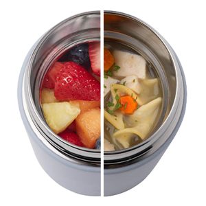 Blue food jar with the left side filled with fruit and the left side filled with chicken noodle soup