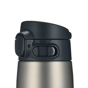 Top portion of the SM-V series mug with focus on the lid and the security lock
