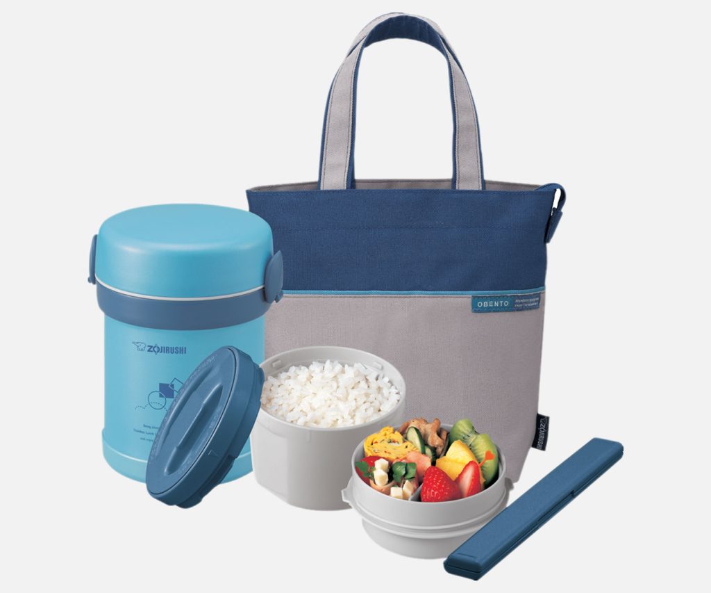 Light blue lunch jar with two containers filled with food, a chopstick set, and carrying tote.