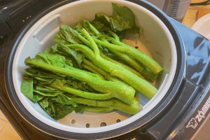 Chinese broccoli steamed in rice cooker