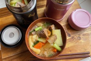 miso soup served in food jars