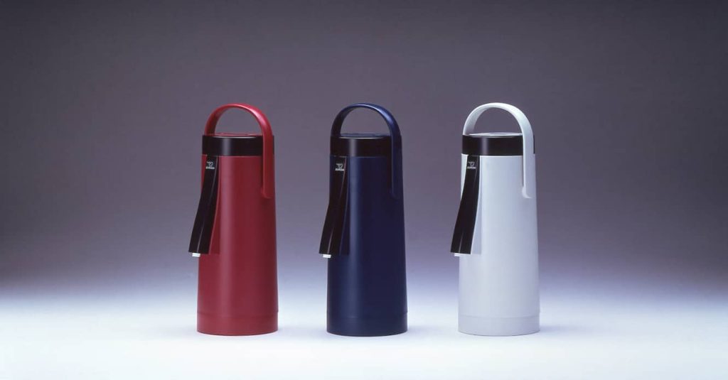 Three carafes in red, blue, and white