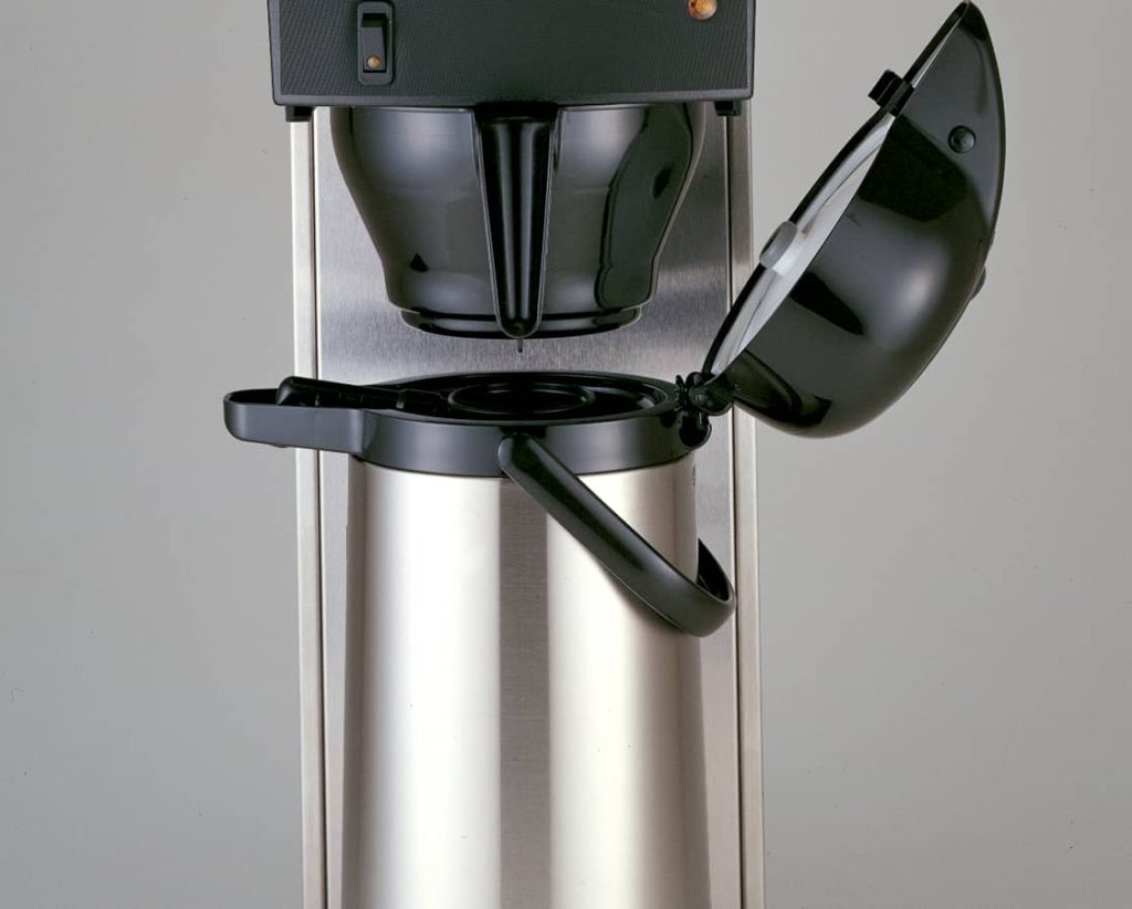 Beverage dispenser under a commercial sized coffee maker 