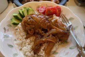chicken adobo on bed of white rice