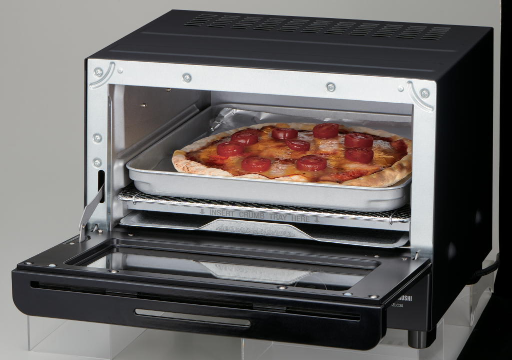 Pizza baking inside of the oven
