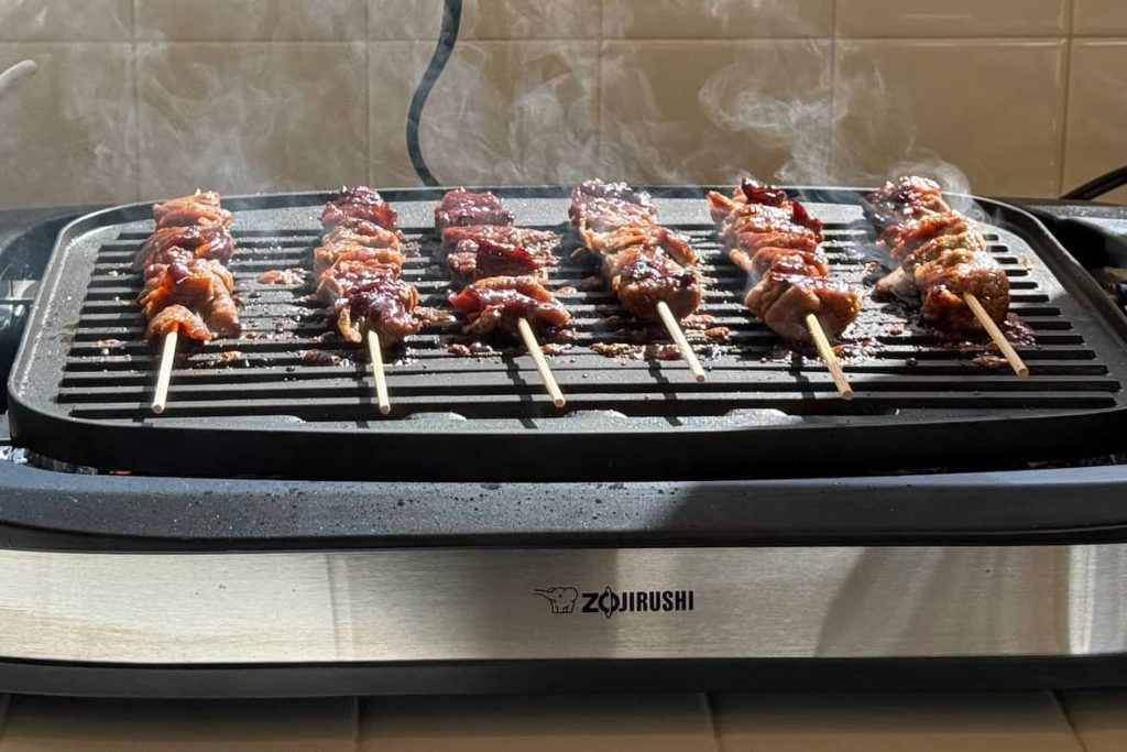 smoky teriyaki sticks on grill