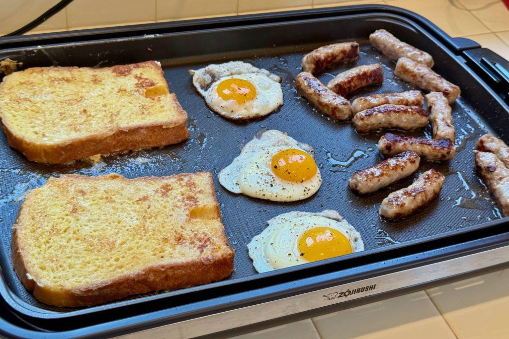French toast, fried eggs and sausage