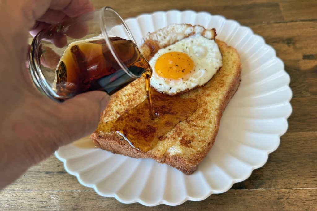maple syrup pouring on French toast