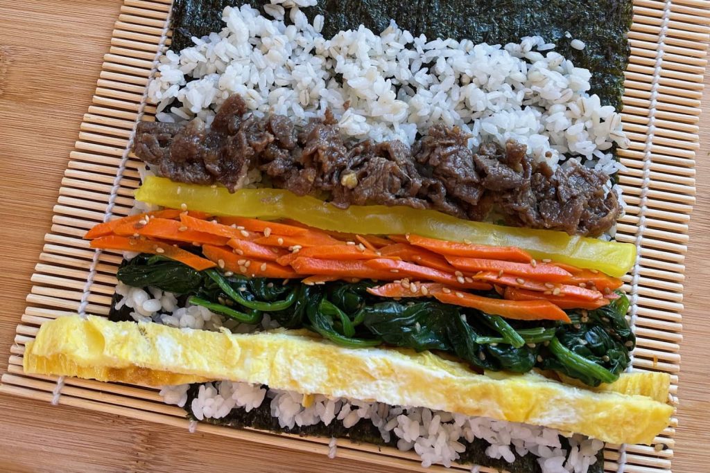 Making Korean kimbap using sushi roller