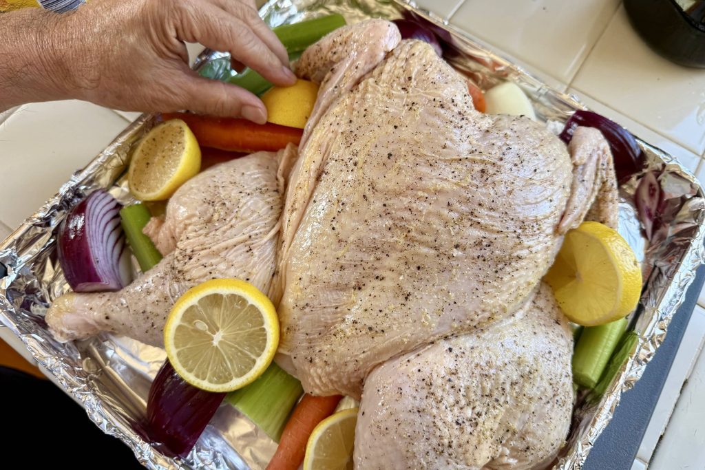 dressing chicken with veggies