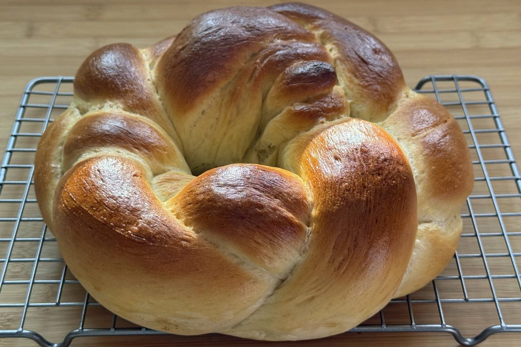 fresh baked pretzel bread resting to cool on rack