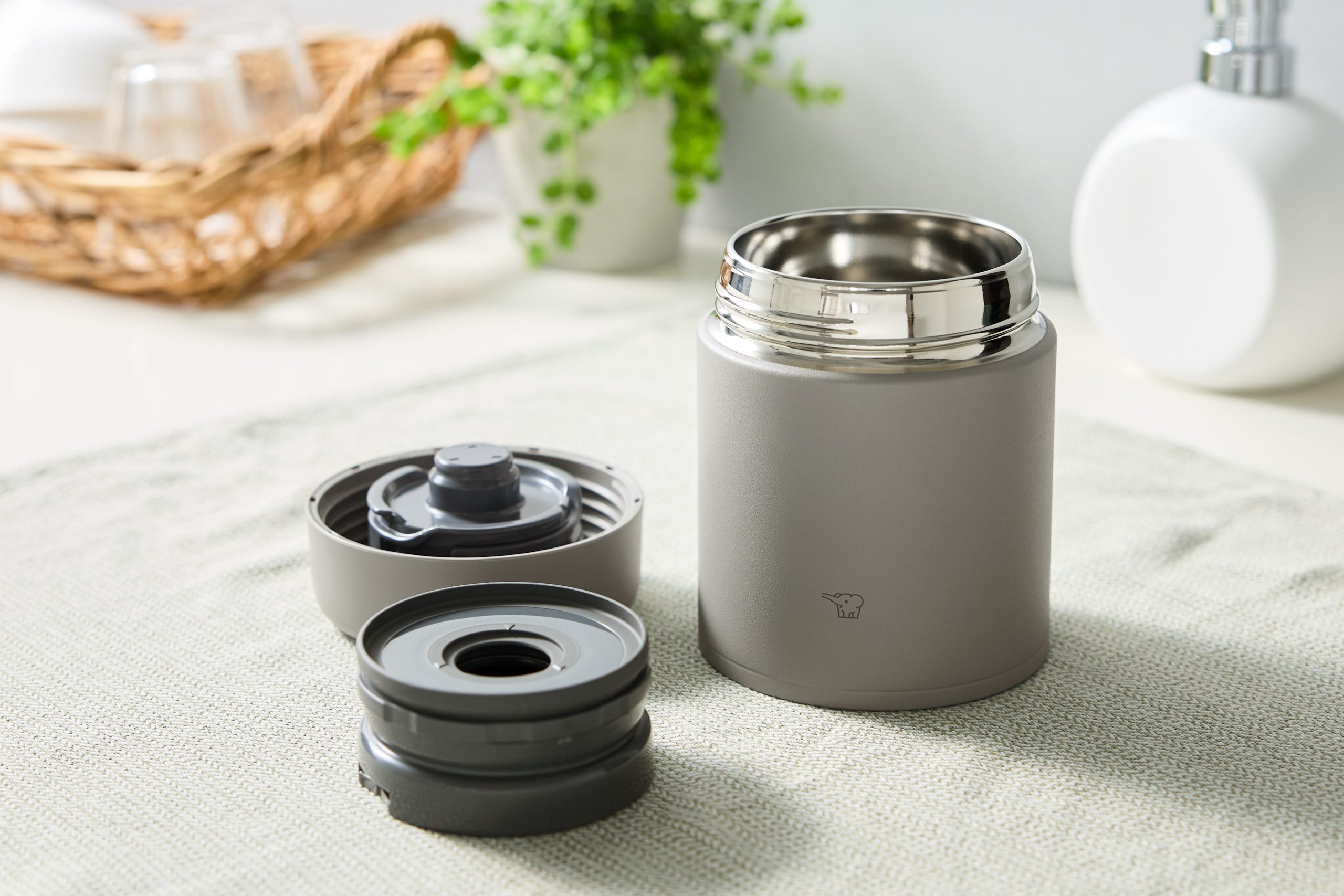 Grey food jar, lid open
