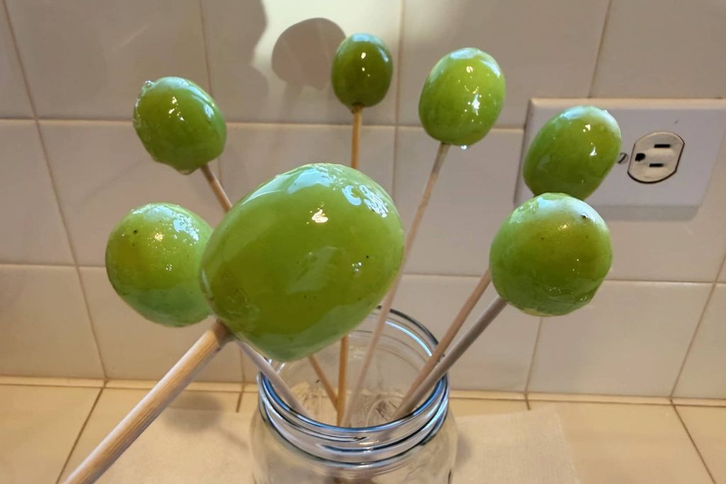 candy glazed grapes on a stick