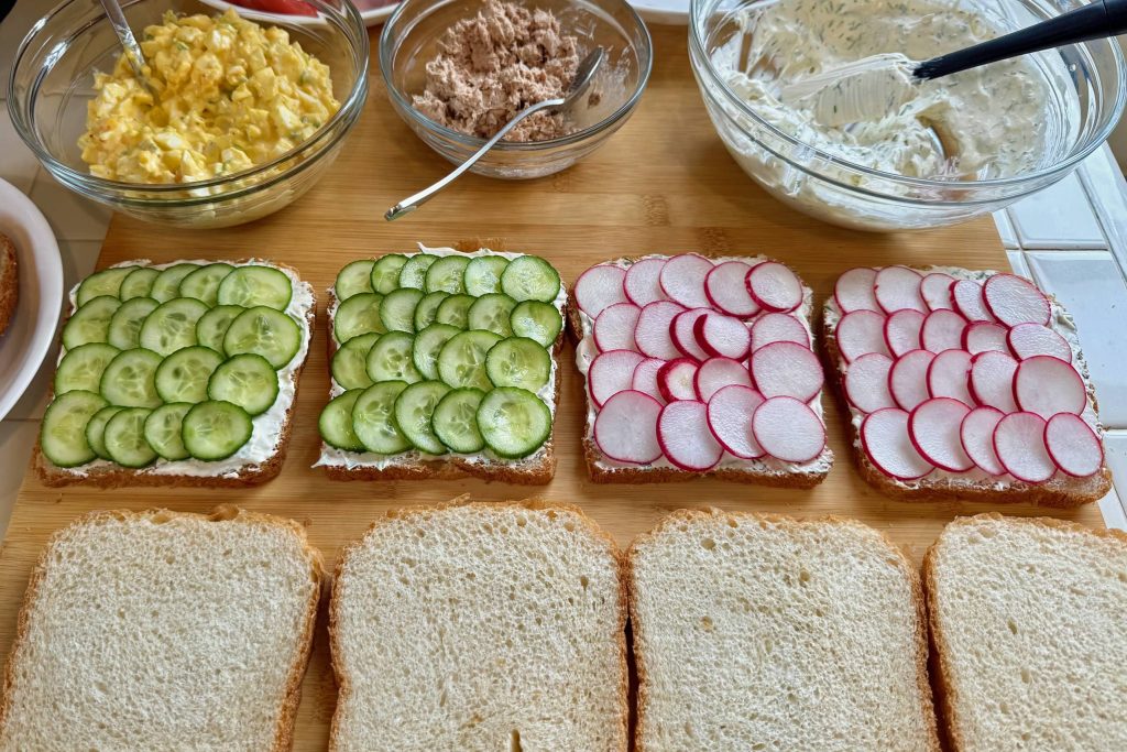 sandwich prep with cucumber, radish