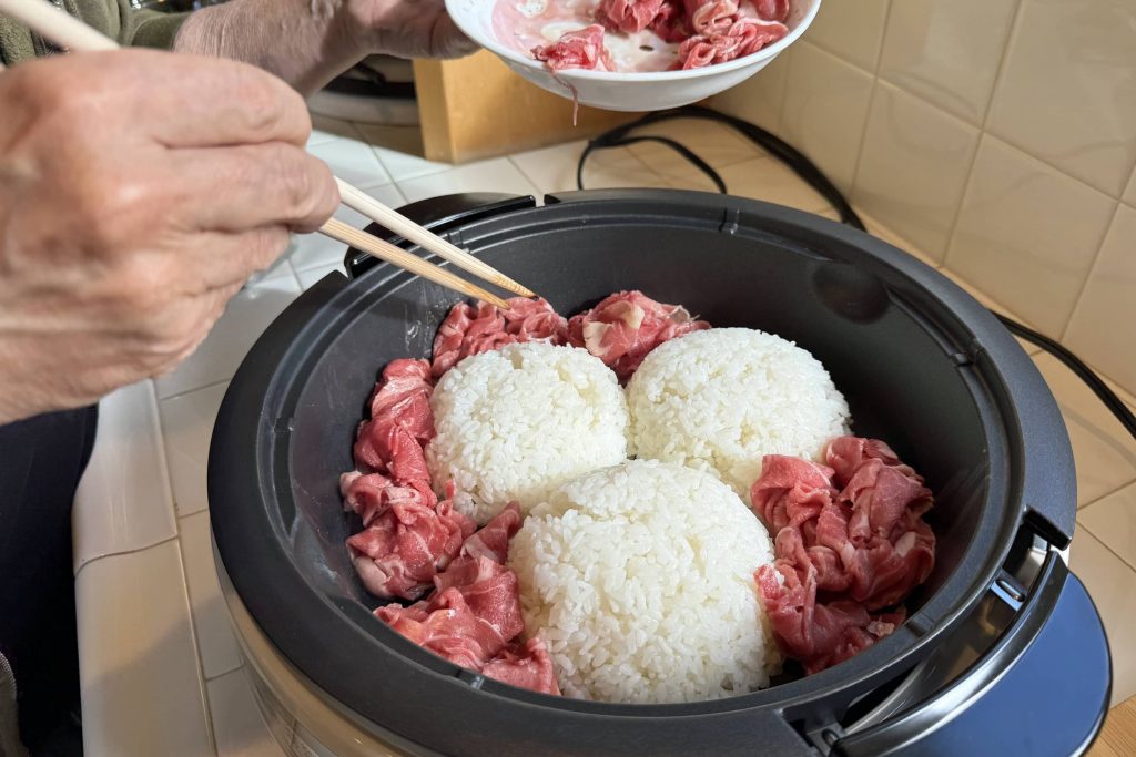 rice and beef frying in skillet