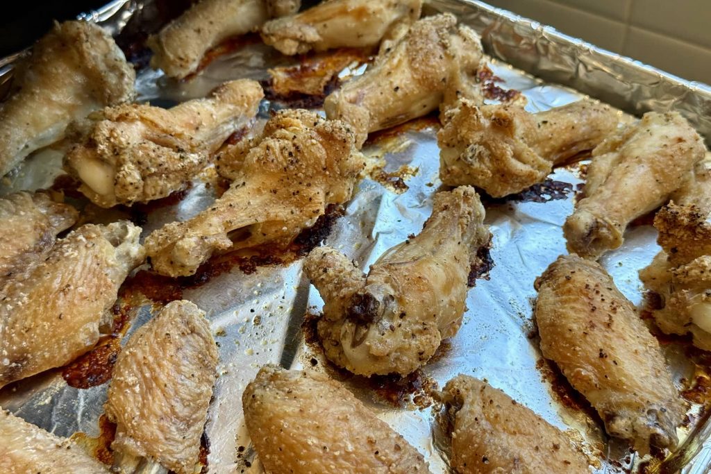 Chicken wings crisply baked on baking sheet