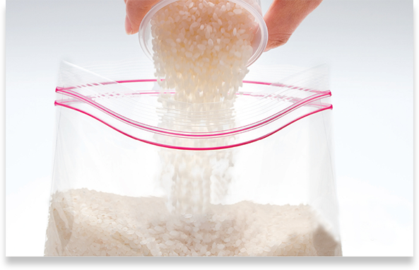 Pouring Rice in a Bag