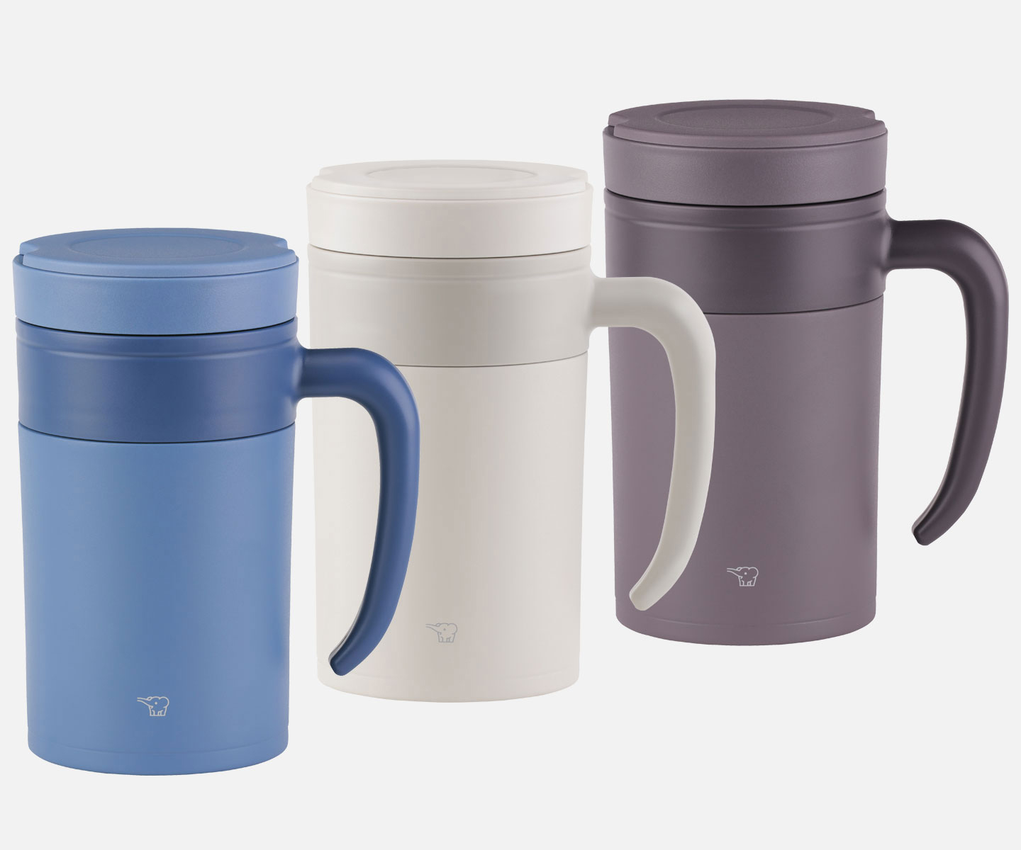 Three tumblers with a handle in diagonal formation, in colors blue, white and brown in this order.
